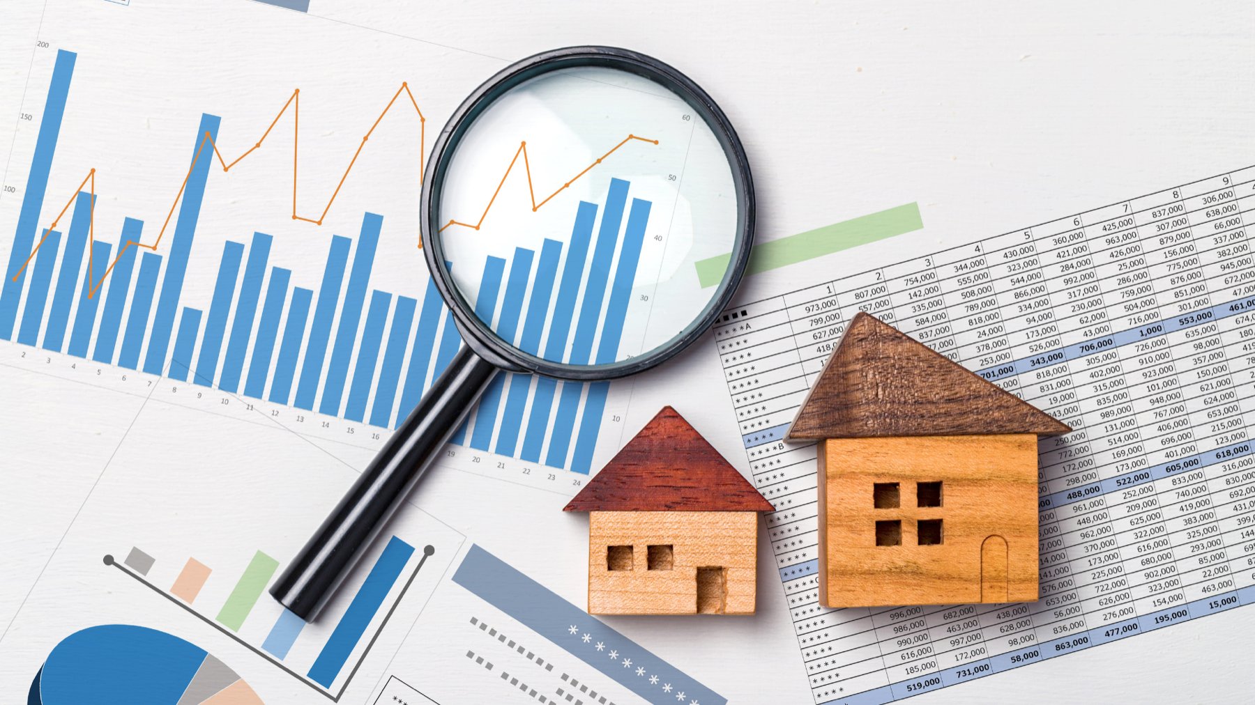 Financial charts, spreadsheet, and model homes representing equity compensation and home buying power