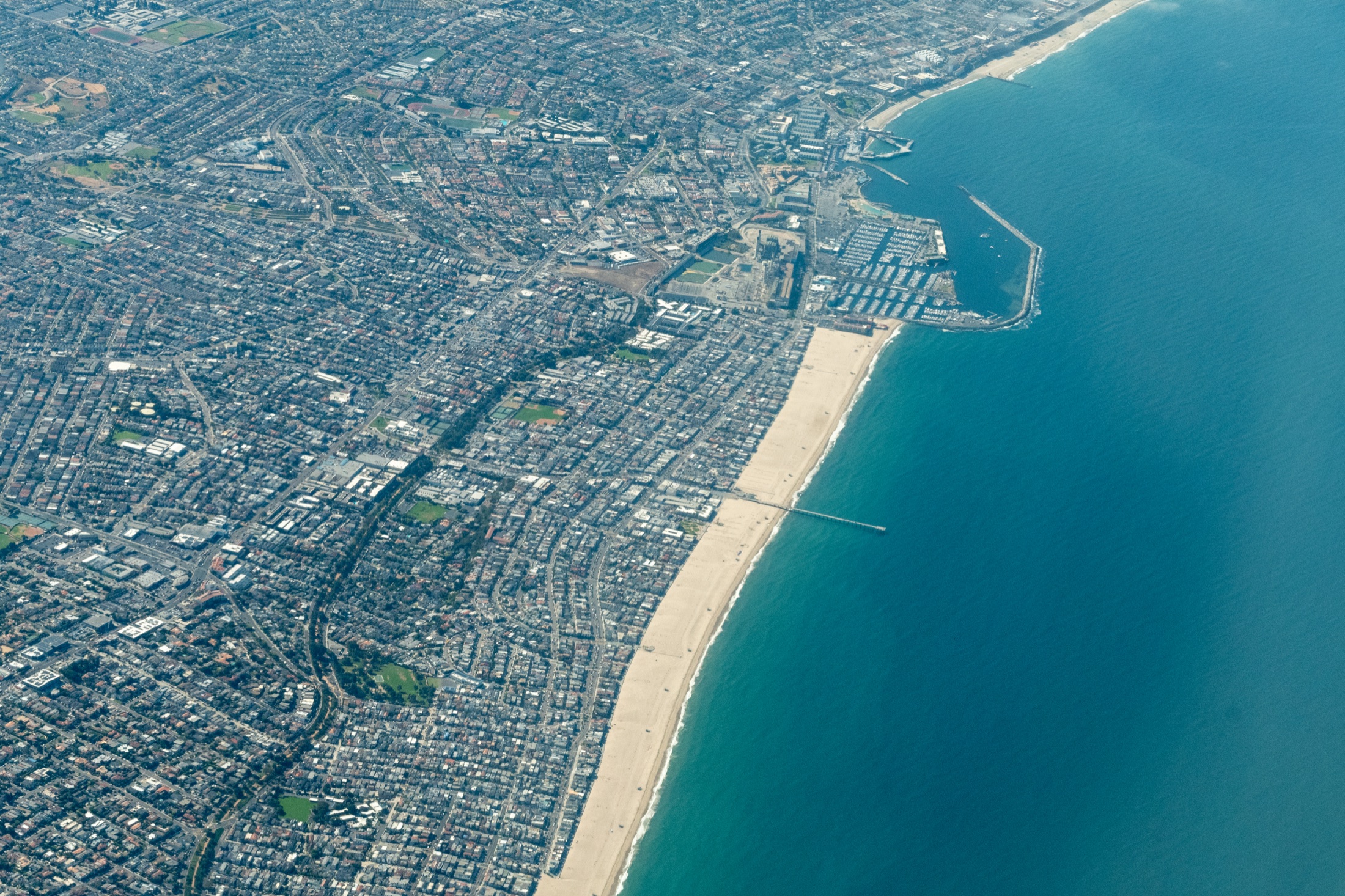Aerial view of Manhattan Beach, Hermosa Beach, and the South Bay coastline for a relocation comparison